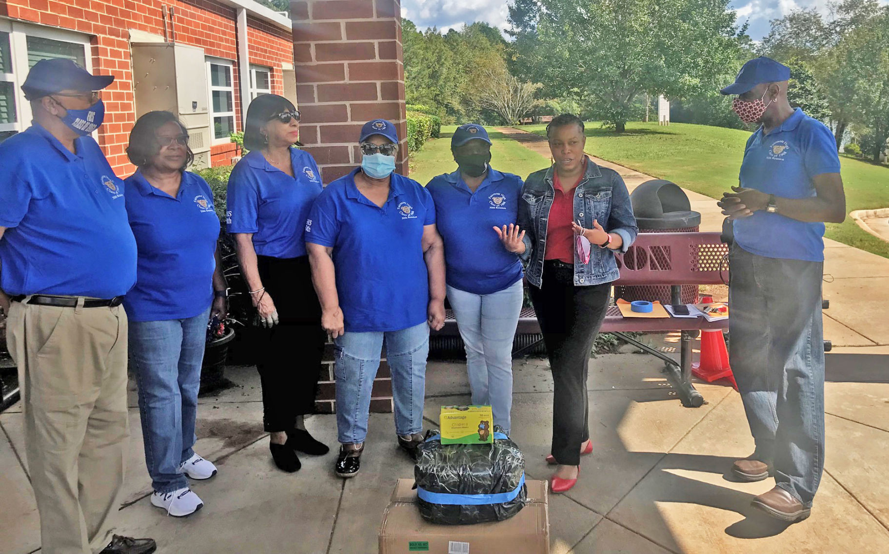 Fairmont alumni donate masks to Atkinson Elementary